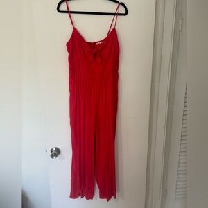 Francesca’s red spaghetti strap jumper. Size: L